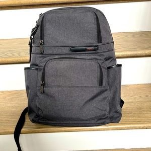 Grey Tumi backpack
